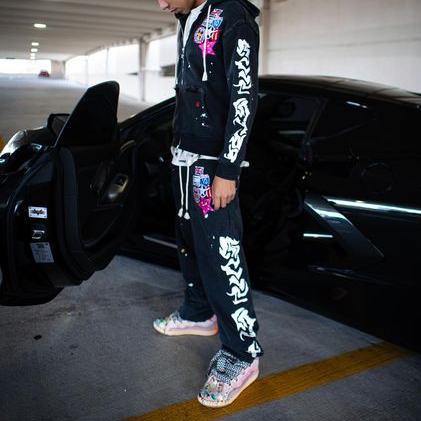 Ink-splashed print hoodie and casual pants set